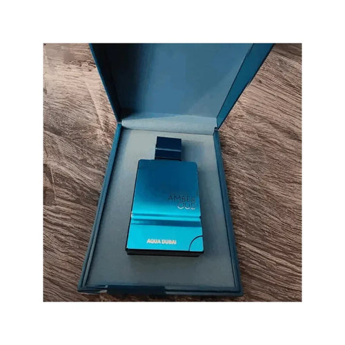Amber Oud Aqua Dubai Extrait de Parfum: Vibrant Blue Bottle, Fresh Aquatic Scent for Men